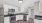 a kitchen with white cabinets