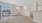 an empty living room area with carpet and a large window