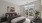 a bedroom with a bed and a table