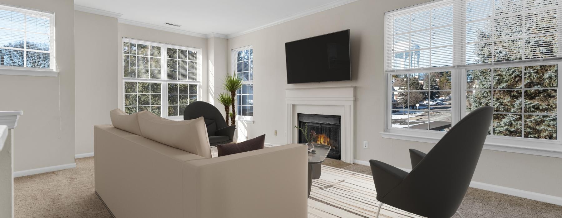a living room with a fireplace